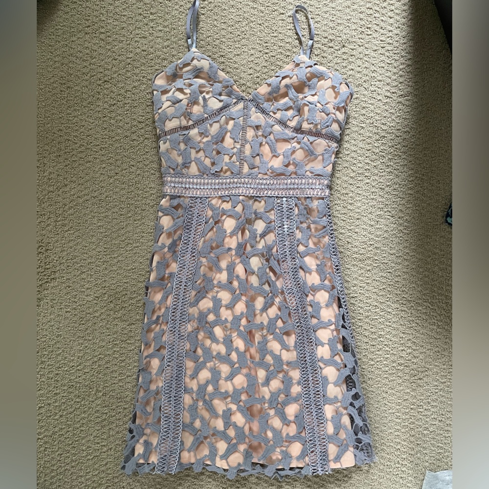 Barely worn Anthropologie mini dress size 0. Purple lace overlay on pink